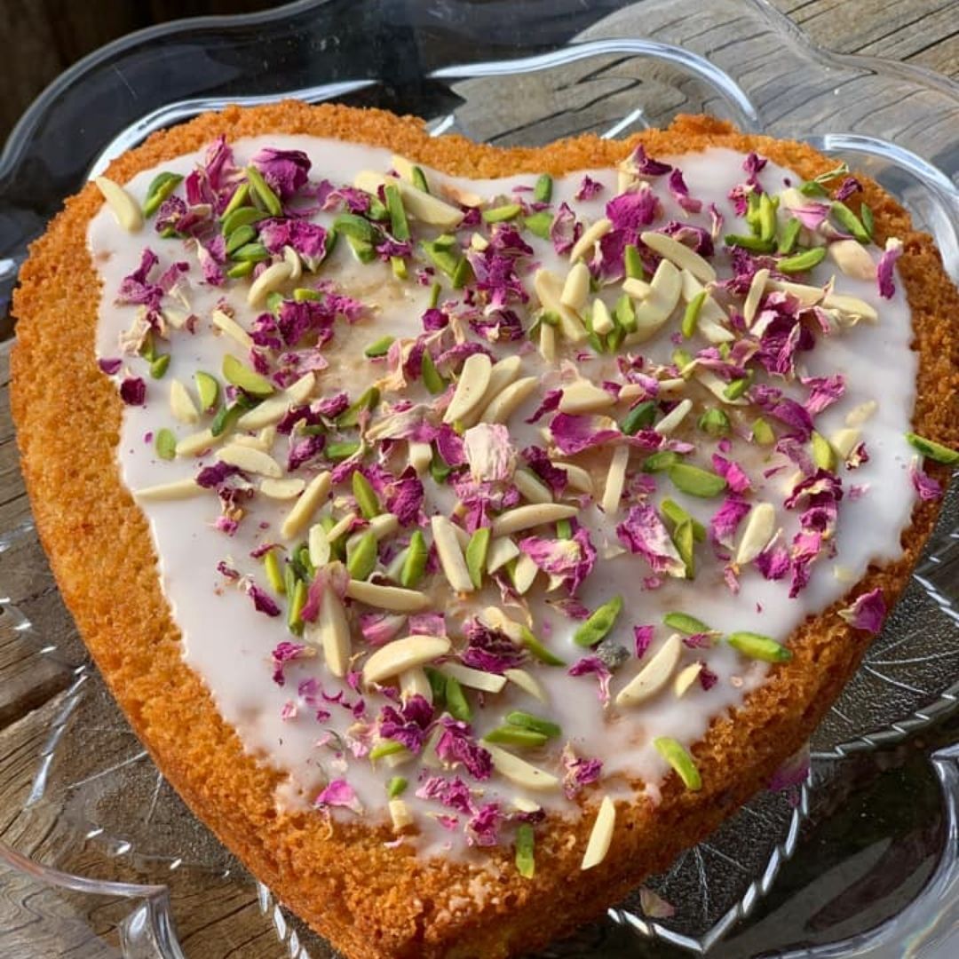 Persian Love Cake made with Exotic Bazaar Saffron Love Cake pre mix . Almond based gluten free cake with rosewater, rose petal garnish